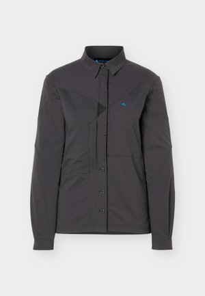 Chaqueta de manga larga de color gris oscuro con botones, cuello, bolsillos delanteros y un sutil logo azul en el pecho izquierdo.