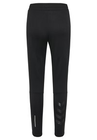 Svarta träningsbyxor med en slät textur, som har en bred elastisk midja och reflekterande detaljer på nederbenen.