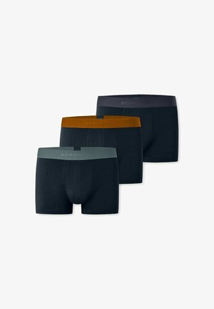 Three pairs of black men's boxer briefs with waistbands in gray, brown, and dark gray, arranged staggered on a white background.