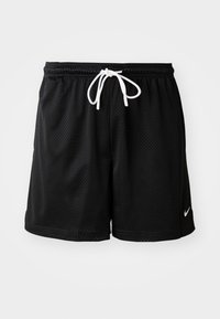 Shorts de sport en mesh noir avec cordon blanc et petit logo Nike blanc sur l'ourlet inférieur gauche, sur un fond blanc uni.