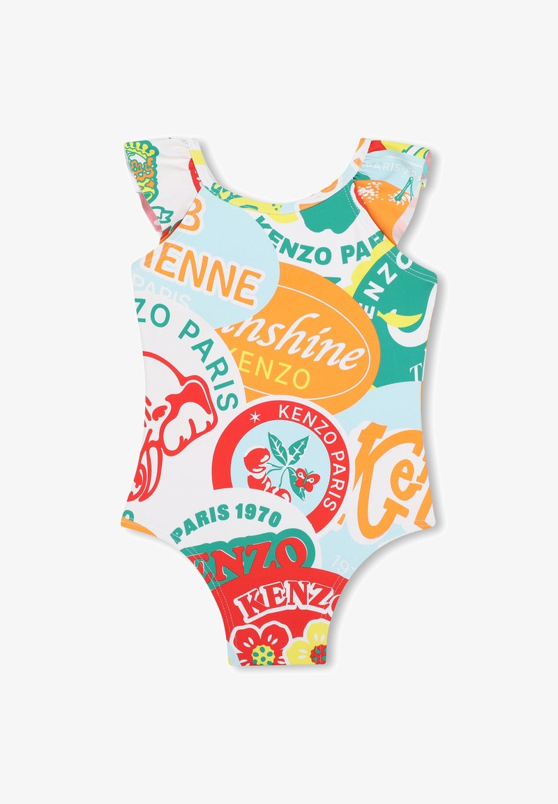 Maillot de bain une pièce avec des bretelles froncées, arborant un imprimé multicolore de logos sur un fond blanc. Fabriqué en tissu extensible.