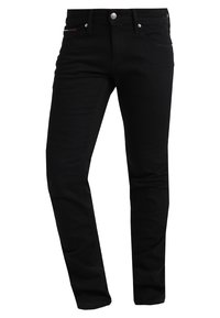 Černé džínové kalhoty se slim fit, pěti kapsami, kovovým zapínáním a jemným červeným prošitím na přední kapse.