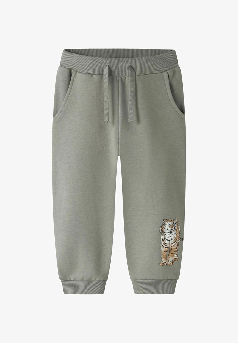 Pantalon de survêtement en coton gris avec taille côtelée, cordon de serrage, poches latérales et un motif de tigre brodé près du bas.