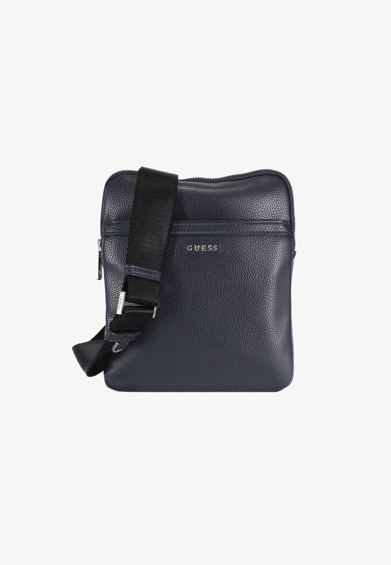 Borsa a tracolla in pelle testurizzata blu navy con chiusura a zip, tracolla nera regolabile e tasca frontale con dettagli del logo argentato.