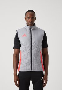 adidas Performance TIRO24 COMPETITION WINTERIZED VEST - Chaleco - light onix/shock red