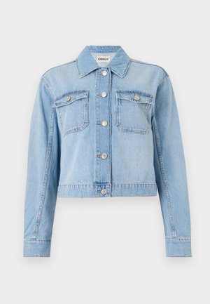 Helehelesinine teksajakk, millel on lühendatud disain, kaks rinnakotti, hõbedased nupud ja juhuslikult laiali asetatud sädelevad kivid.