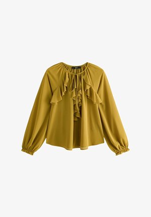 Blusa gialla senape con maniche lunghe, parte anteriore arricciata, scollatura rotonda e polsini elastici. Tessuto leggero con una vestibilità fluida.