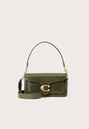 Green leather handbag with a structured shape. Features a gold hardware clasp, a detachable shoulder strap, and stitching accents.