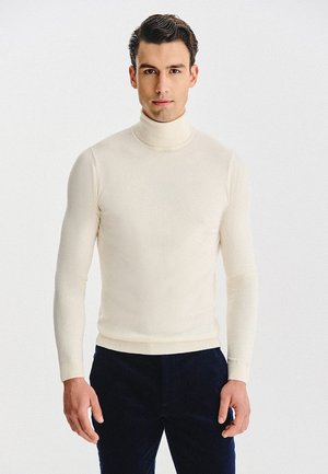 - Sweter