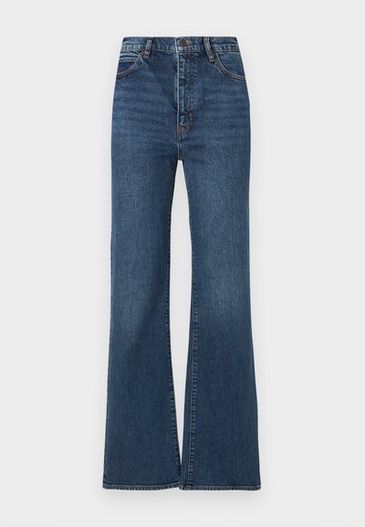 Modré džínsové nohavice s rozšírenými nohavicami, vysokým pásom, dizajnom s piatimi vreckami a jemným vyblednutím po látke pre textúru a hĺbku.