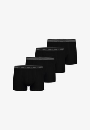 Boxers noirs avec une ceinture grise extensible portant le texte « nur der ». Le tissu est lisse et la coupe épouse le corps.