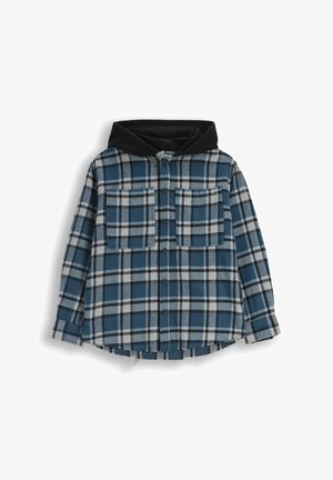 Koszula w kratę w kolorze niebieskim, czarnym i białym z czarnym kapturem. Posiada dwie kieszenie na piersi i zapięcie na guziki, wykonana z miękkiego materiału flanelowego.