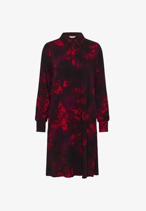 Crna haljina s crvenim apstraktnim uzorkom, ovratnikom, dugim rukavima s elastičnim manžetama i opuštenim krojem koji seže do sredine bedara.