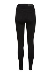 Jean noir taille fine avec deux poches arrière et passants pour ceinture, présenté de dos sur un fond blanc.