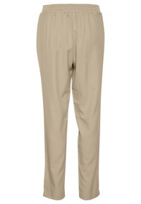 Pantalons beiges à taille élastique avec une coupe décontractée. Texture lisse et design à jambes droites, minimaliste sans ornements supplémentaires.