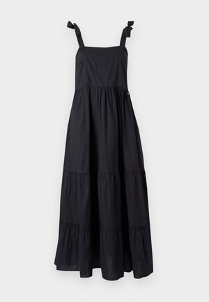 Svart maxi-kjole med knyte stropper, firkantet halslinje og lagdelt volangdesign. Laget av lett stoff med en jevn tekstur.