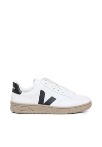 White leather sneakers featuring a black V logo on the side, black heel tab, and a beige rubber sole with a textured finish.