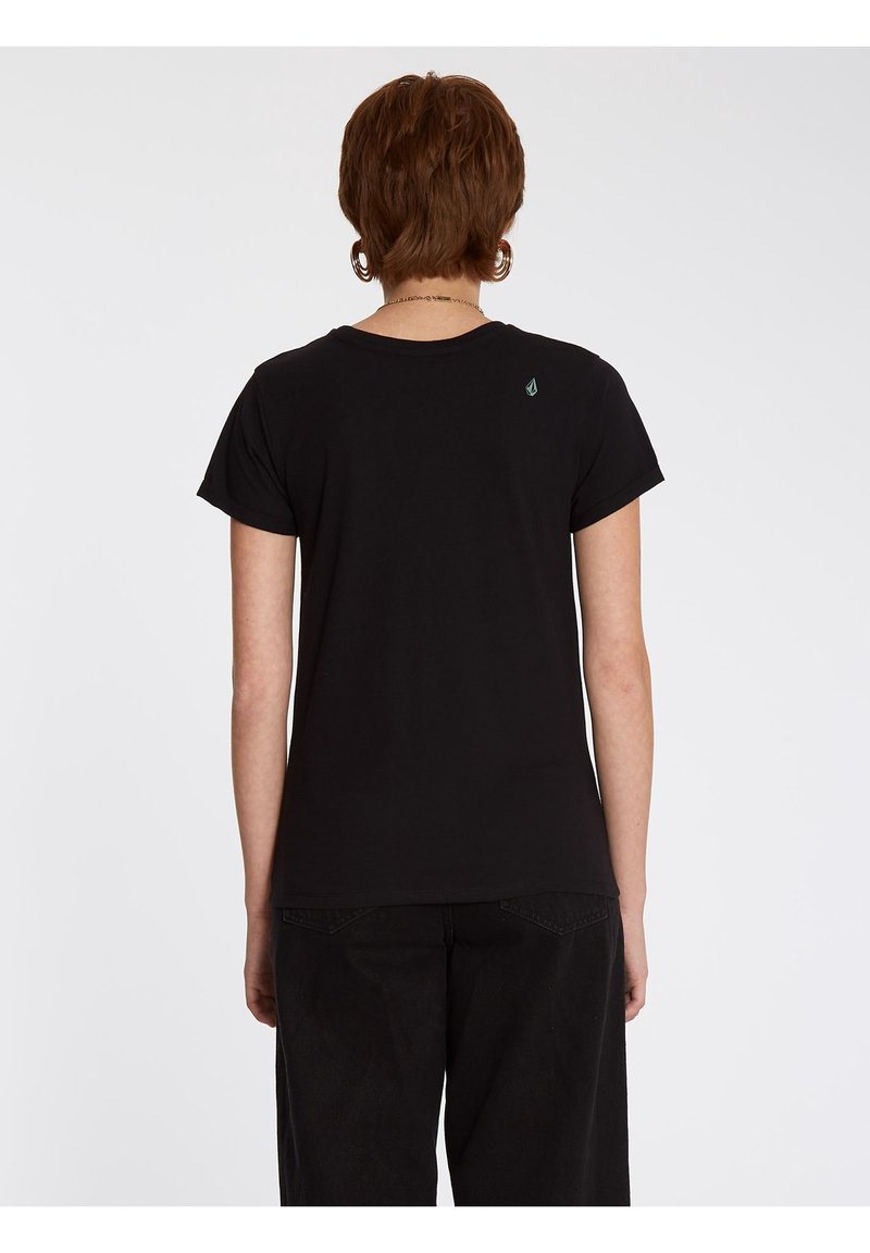 T-shirt en coton noir à manches courtes, col rond et manches retroussées. Présente un petit logo au niveau du haut du dos.