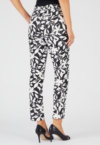Damart Pantaloni - noir feuillage