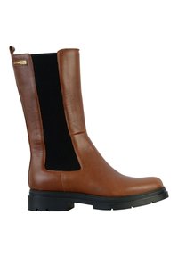 Botines de cuero marrón con paneles laterales elásticos negros y suela de goma negra.