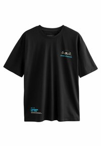 Sort bomulds t-shirt med korte ærmer. Har Vitruvian Man grafik i lyseblå og tekstdetaljer på venstre bryst og nederkant.