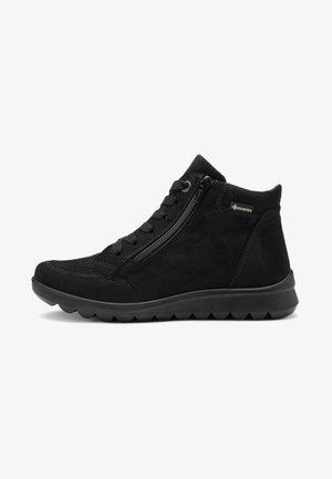 Botín de ante negro con cremallera lateral, cordones en la parte delantera, etiqueta Gore-Tex y suela de goma texturizada para uso exterior.
