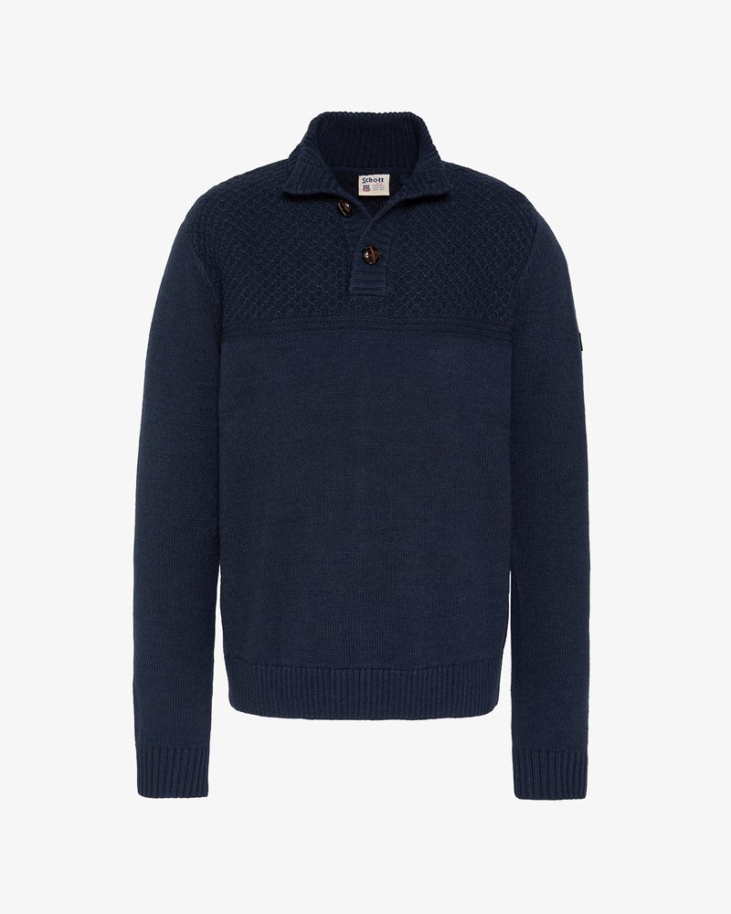 Marineblauer Strickpullover mit strukturiertem Oberpanel, knöpfbarem Kragen und gerippten Bündchen und Saum. Hergestellt aus einem weichen, warmen Material.