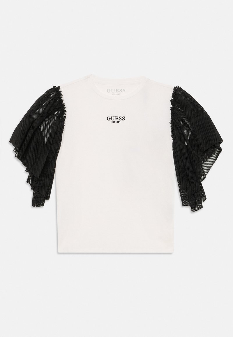 Λευκό μπλουζάκι Guess με μαύρα πλεκτά μανίκια με ρίγες και εκτύπωση "GUESS EST.1981" στο στήθος.