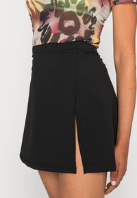 Weekday ANNA SLIT SKIRT - Minissaia - black dark