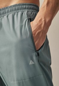 Next ACTIVE JOGGERS -REGULAR FIT - Pantalones deportivos - grey