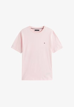 Lyserød bomulds t-shirt med rund halsudskæring, korte ærmer og en lille logoaccent på brystet. Blød tekstur, afslappet pasform.