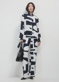 Calliope PALAZZO STAMPA LETTERING - Stoffhose - var bianco lana