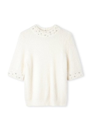 Biały, puszysty top z krótkim rękawem o okrągłym dekolcie. Posiada ozdoby wokół kołnierzyka i mankieci, które dodają szczegółów.