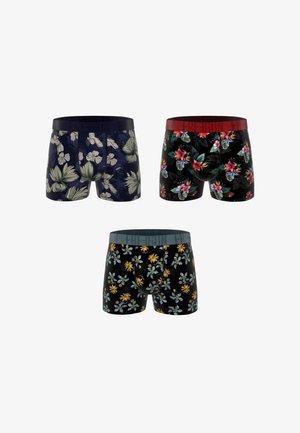 Trois paires de boxers pour hommes avec des motifs floraux : marine avec des feuilles blanches, noir avec des fleurs rouges et roses, noir avec des fleurs jaunes et bleues.