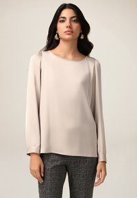 Unausgewählt, beige