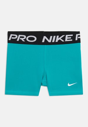 Turkis atletiske kompressionsshorts med sort elastik i taljen med hvid "NIKE PRO" tekst og hvid Nike swoosh-logo på venstre ben.