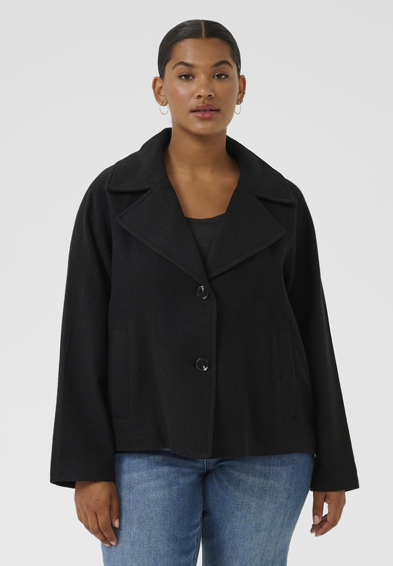 Schwarze Wollmischung Jacke mit breitem Kragen, vorderen Knöpfen und Seitentaschen, mit einer lockeren Passform und leicht strukturiertem Oberflächenmaterial.