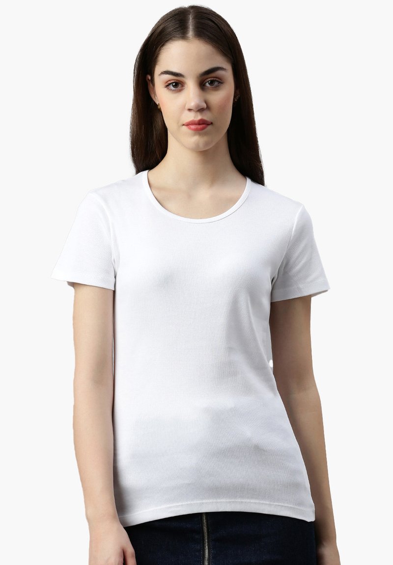 T-shirt bianco a maniche corte con scollatura rotonda, realizzato in cotone a coste, silhouette aderente con una texture liscia.