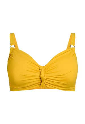 Dzeltena bikini krūšturis ar mezglošanas detaļu centrā. Izgatavots no elastīgas auduma, tam ir plaši regulējami siksniņas un gluda apdare.