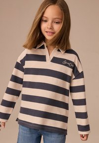Polo shirt met lange mouwen in beige en navy, met een kraag en borduursel "Sports Club" op de borst. Comfortabele stof.