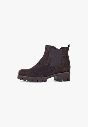 Black suede ankle boots with elastic side panels, a chunky heel, and a pull tab at the back. Textured finish and serrated sole pattern.