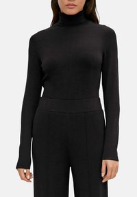 comma Sweter