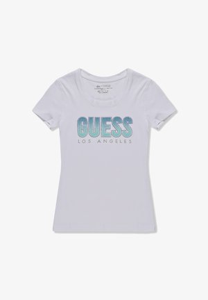 Witte fitted t-shirt met korte mouwen en een ronde halslijn. Beschikt over "GUESS LOS ANGELES" in een verloop van blauw met strass accenten op de voorkant.