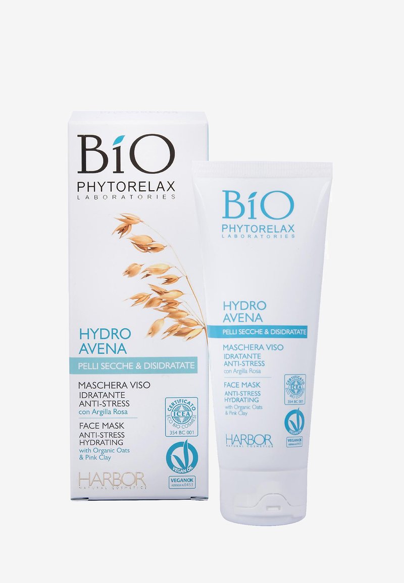 Maschera viso Hydro Avena in un tubo bianco, con testo blu e immagini di avena; confezionata in una scatola coordinata con accenti botanici.