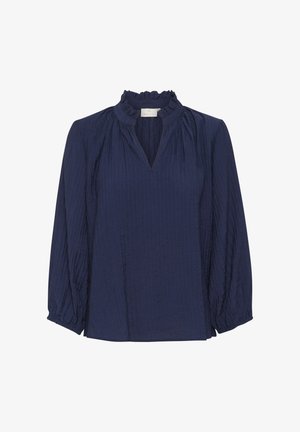 Blouse bleu marine avec un col montant à volants, texture plissée et longues manches ballons. Comprend un décolleté en V. Tissu léger.