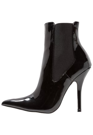 Stivaletti con tacco - black