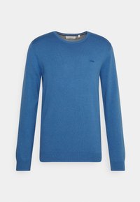 Blauer Rundhalsausschnitt-Pullover aus weichem Stoff. Lange Ärmel mit Rippbündchen und Saum. Kleines Logo auf der linken Brust gestickt.