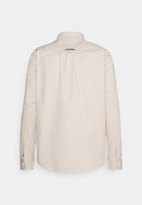 Tommy Hilfiger Übergangsjacke - white