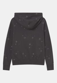 Dark gray hooded sweatshirt with scattered faded star patterns, long sleeves, and ribbed cuffs and hem, shown from the back.