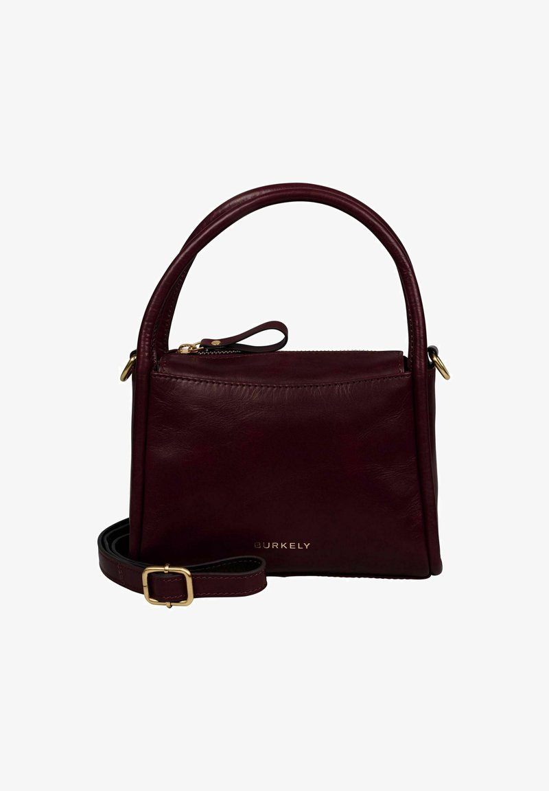 Sac à main en cuir bordeaux avec un design structuré, poignée supérieure, bandoulière ajustable et accents dorés. Compartiment principal zippé.